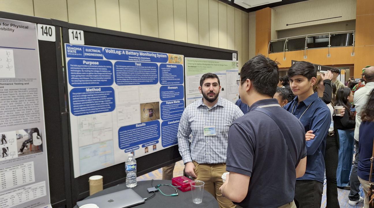 Antonio Kassis and Emanuel Barajas answering questions about their project