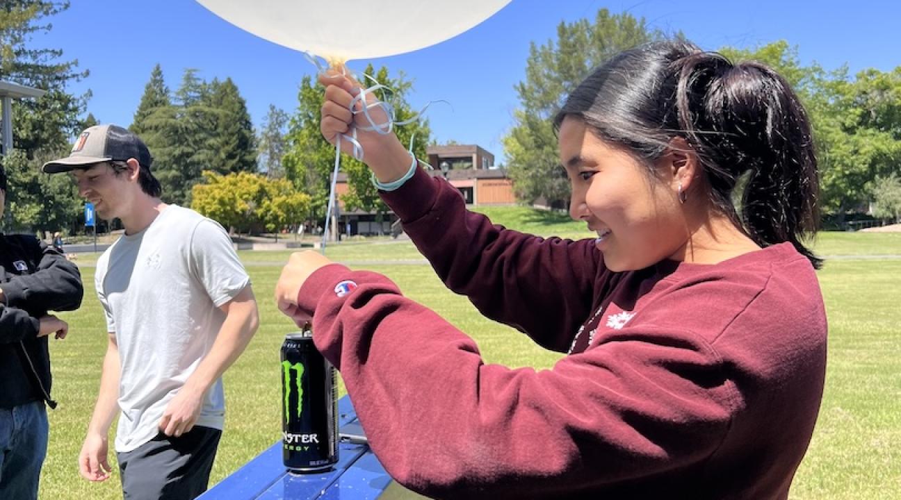 Picture of students preparing the balloon for launch