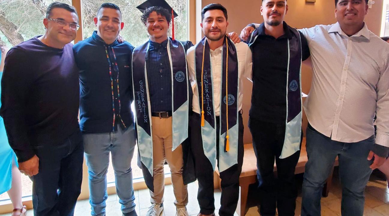 Picture of EE graduates participating in La Raza Graduation