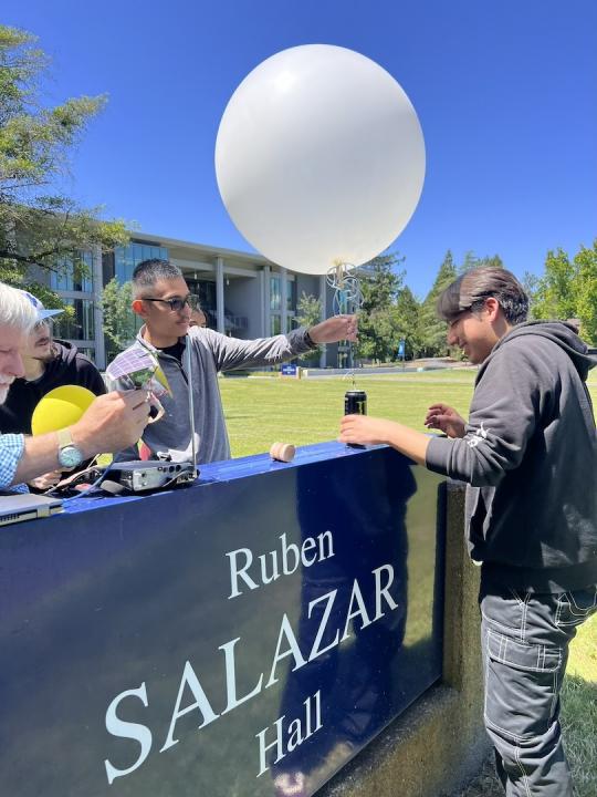 Picture of students preparing the balloon for launch