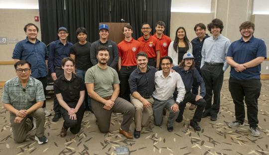 A group picture of senior design students presenting at the Expo